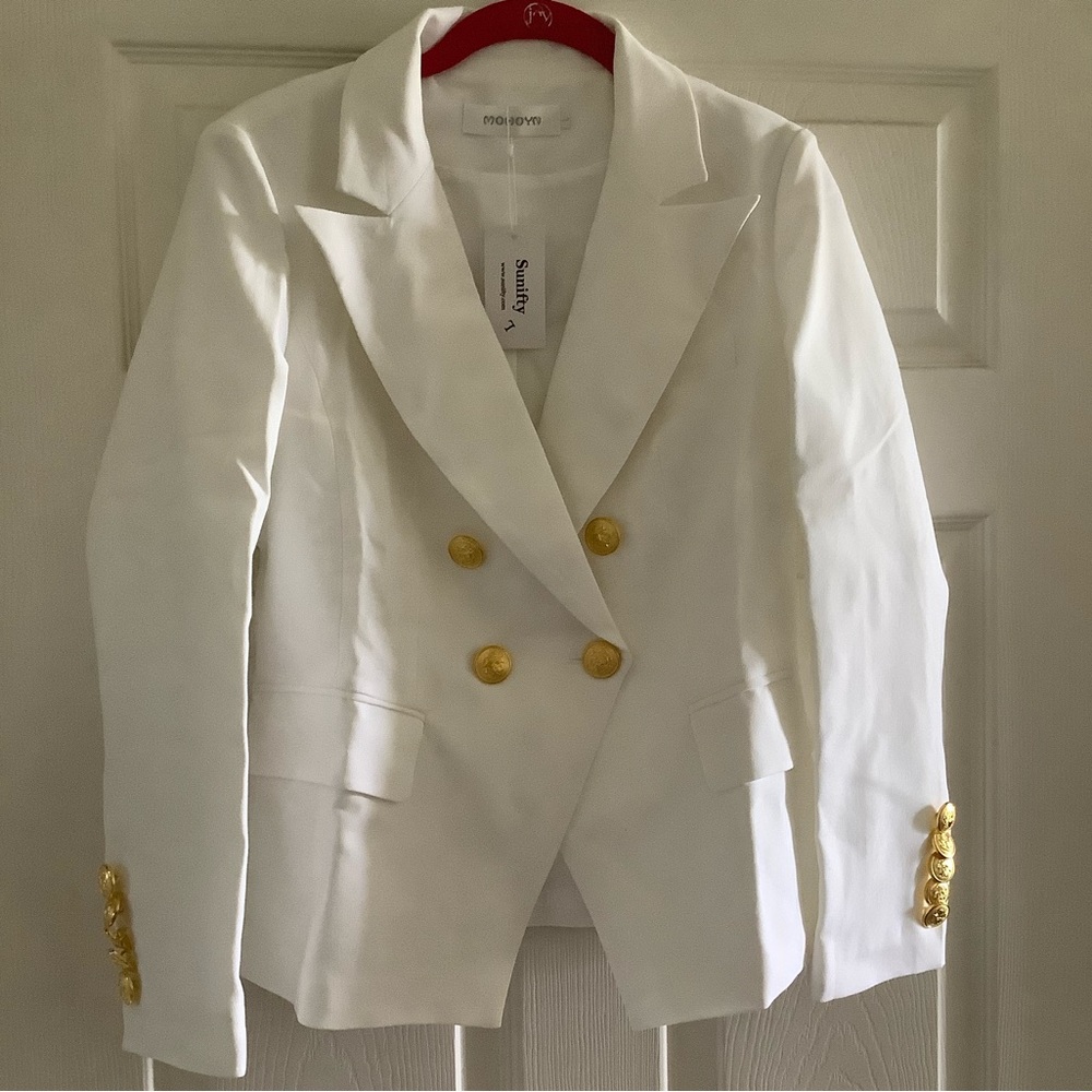 Bright white blazer! Gold buttons. Bottom button is double breasted fasten.